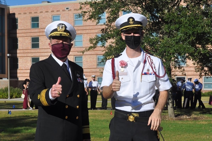 Masington poses next to TAMMA Superintendent Col. Mike Fossum during October's March Around event in College Station. 