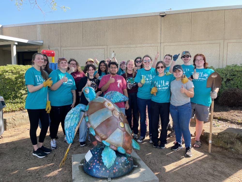 Students cleaning up LA Morgan's gardens